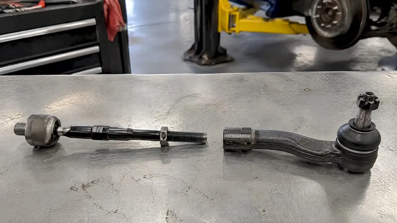 Inner and outer tie rod parts side by side